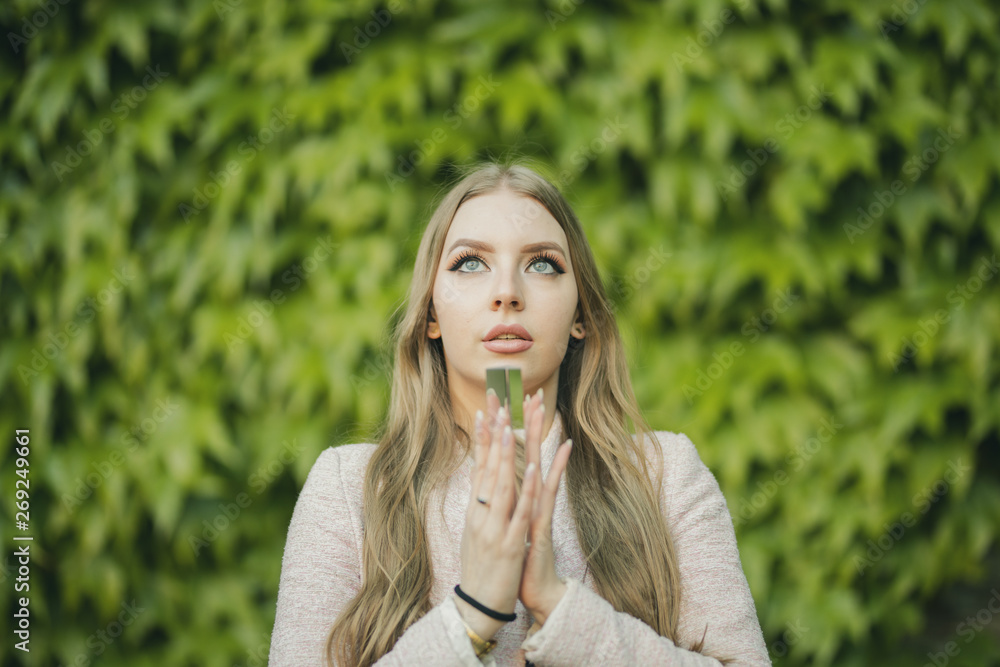 portrait of young woman in park