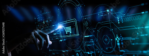 Hand pushing virtual symbol of online shopping with modern UI computer and smart phone.