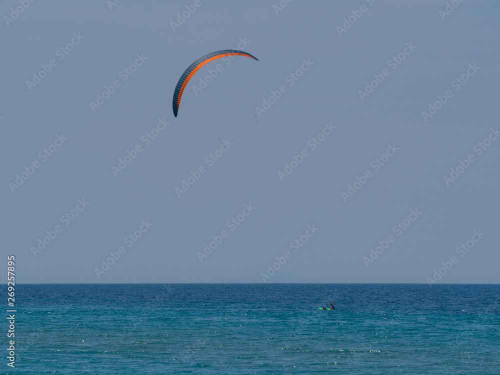 Summer water sports in clear open sea ocean Summer water sports in clear open sea ocean