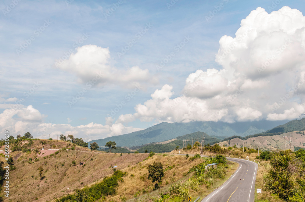 Road and mountain under the blue sky  in Thailand