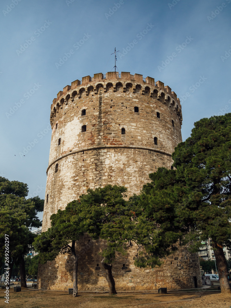 White Tower of Thessaloniki - medieval prison tower, now a museum - wide angle shot White Tower of Thessaloniki - medieval prison tower, now a museum - wide angle shot