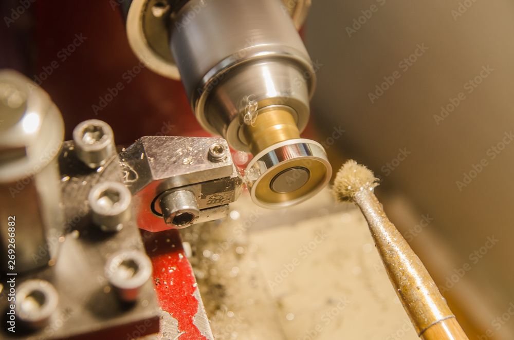 Machining of cylindrical parts on a lathe machine.