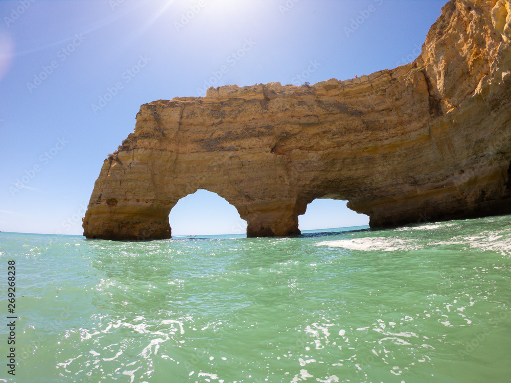 View from boat on coast and cliffs on Atlantic Ocean in Algarve, Portugal 