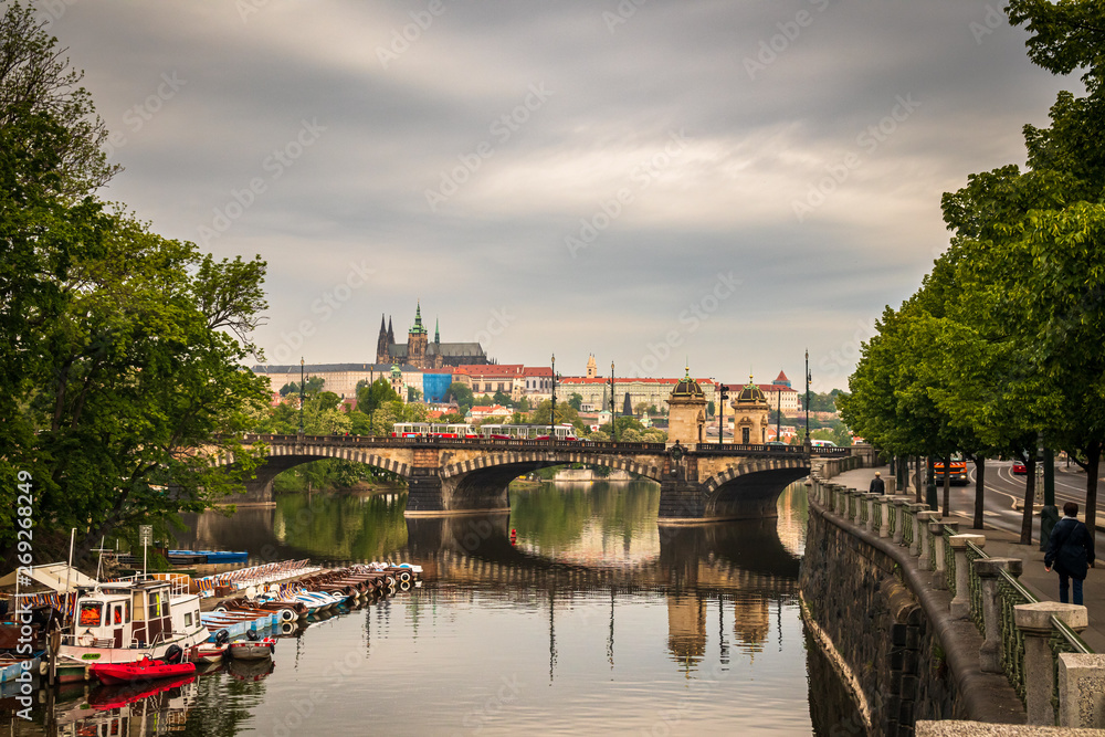 Naklejka premium Beautiful Vltava river in Prague with old town and historical buildings in the background