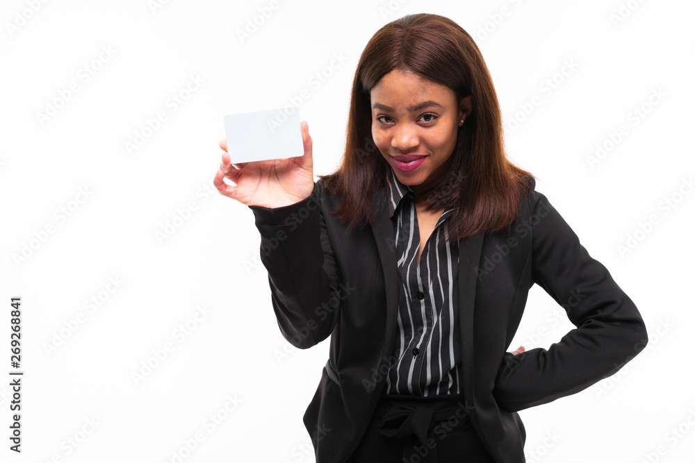 dark-skinned young smilling girl handing a card isolated on white background dark-skinned young smilling girl handing a card isolated on white background