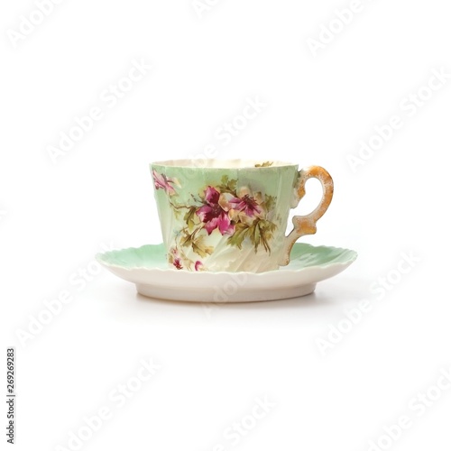 Beautiful porcelain tea cup isolated on a white background