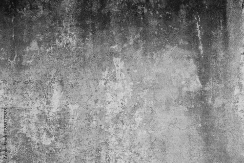 Alte verdreckte Wand mit groben und verschmutzen Strukturen und rissen. Hintergrund im Grunge Stil. Betonwand im Industrial Design.