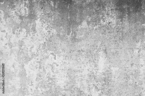 grauer Hintergrund, graue Betonwand, Textur, Strukturierte Wand im Industrial Style. Raue gebrochene und rissige Wand in Grau.