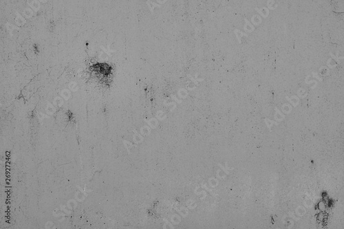 Graue Betonmauer  Grauer Hintergrund  Grau Struktur mit groben und zerkratzen Stzrukturen im Indiustrial Design. Graue Steinmauer als Hintergrund und gestalterisches Element.