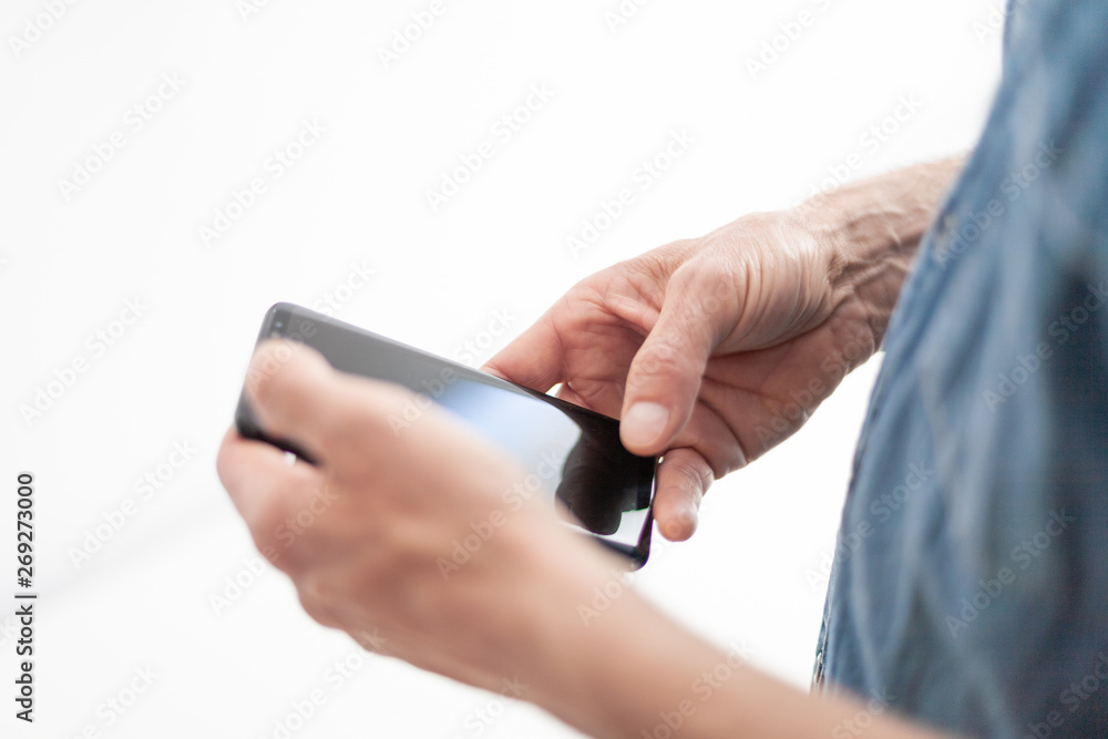 hands of a man using a phone hands of a man using a phone