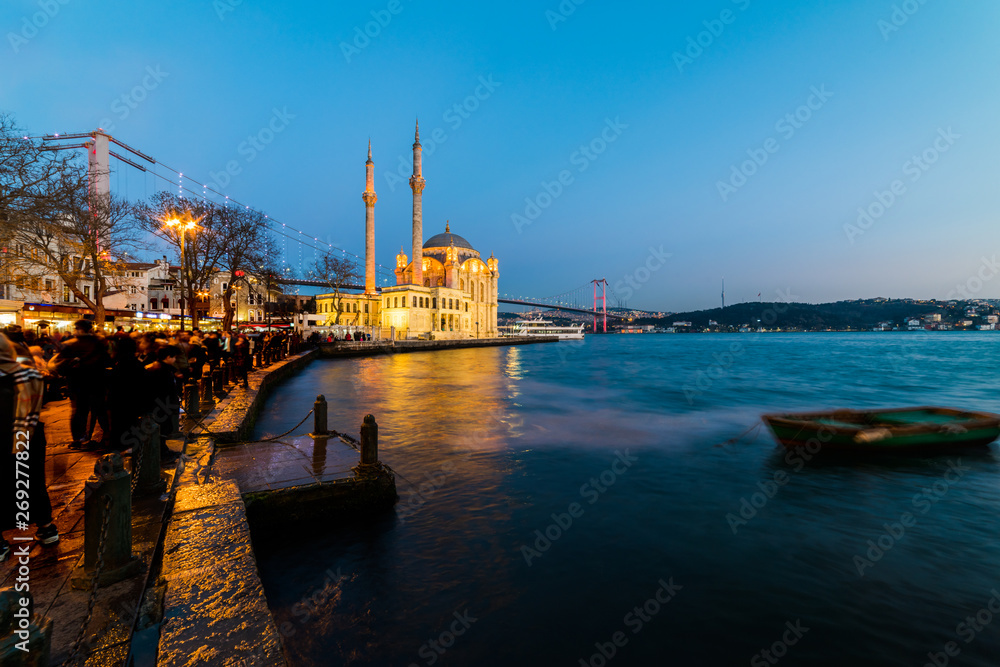 Ortakoy Mosque and Bosphorus Bridge (15th July Martyrs Bridge) night view. Istanbul, Turkey..