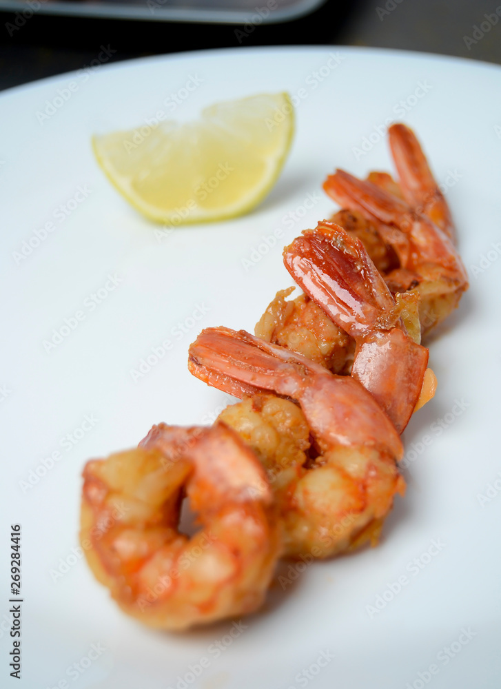 fried shrimp on a white plate fried shrimp on a white plate
