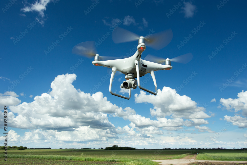 Drone flying above field Drone flying above field