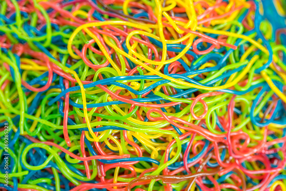 Close up of colorful chewy worm candies