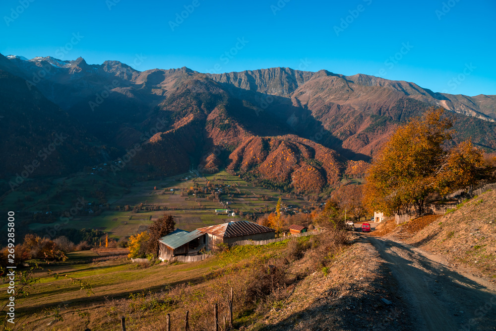 colorful trees in the mountains of Svaneti in the fall. Beautiful landscape