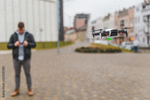 drone close up blurred man on background