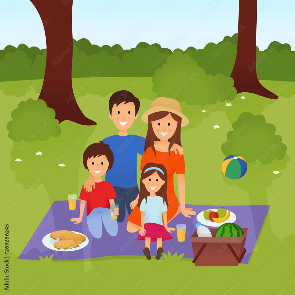Happy family on a picnic. Parent and children are resting in nature in park.
