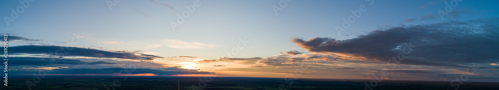 A panorama of clouds at sunset. Air shot
