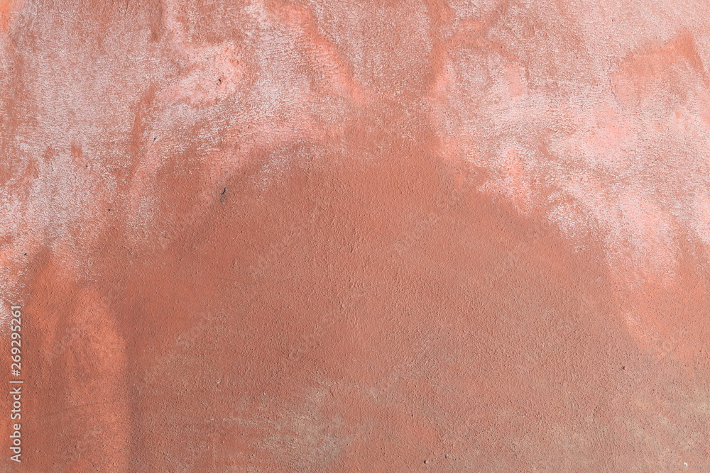 Wall plastered with mortar finished by hand in brown color Wall plastered with mortar finished by hand in brown color