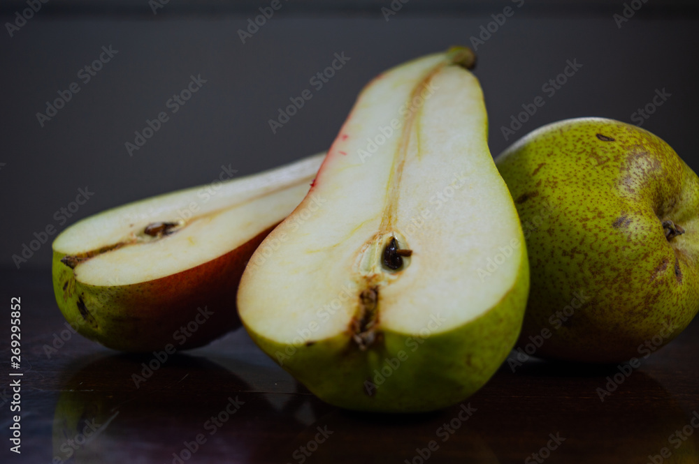 Organic fresh green pears on a table.