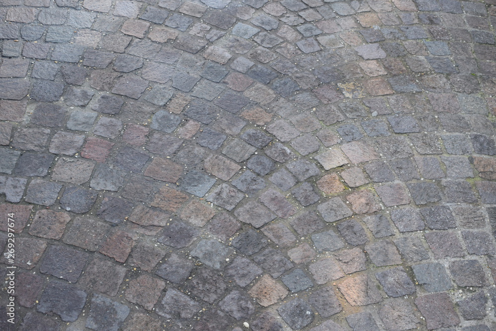 Top view on background texture of straight gray flat stone brick paving stone street street outdoor copyspace, horizontal image Top view on background texture of straight gray flat stone brick paving stone street street outdoor copyspace, horizontal image