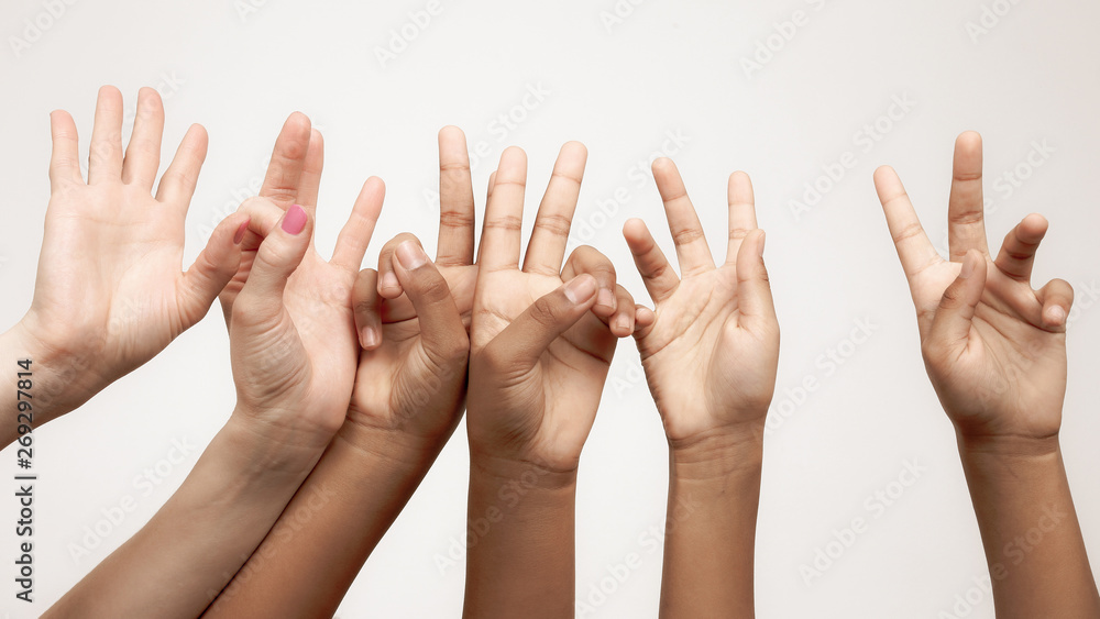 many raised children's expressive hands in a row.