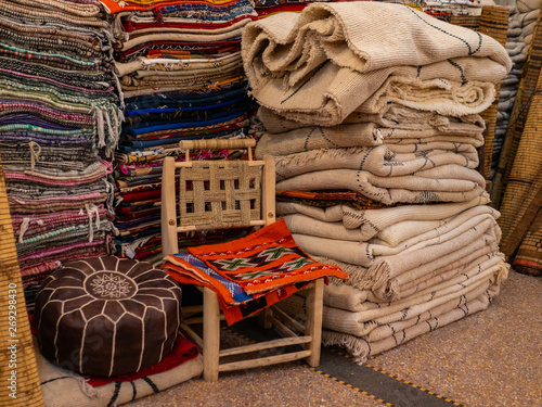 Traditional african arabian moroccan marrakech carpet market, shop with carpets and textile marketplace