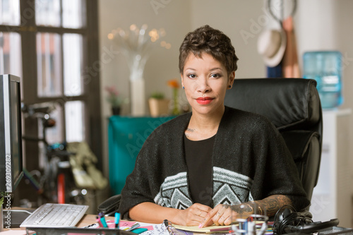 Stylish Woman in a Creative Office