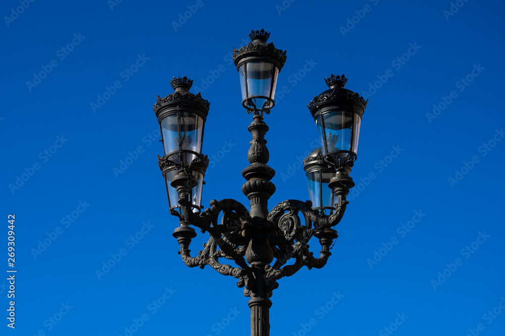 Old street lamp in Santander, Spain