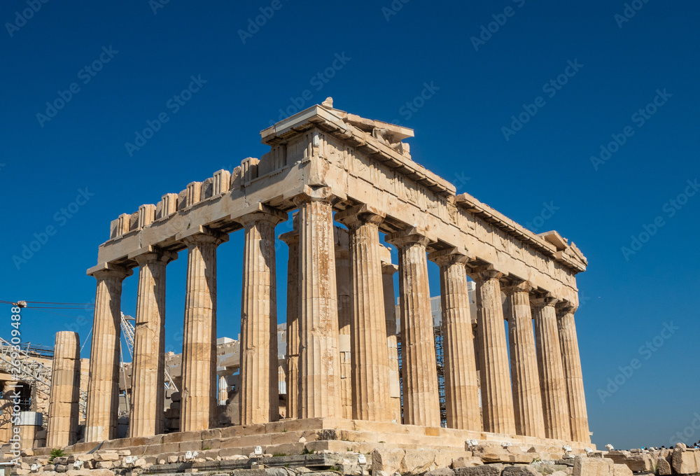 Pantheon of the Athenian Acropolis - the restored ruins of a temple with Doric columns, built in 447?438 BC, Greece