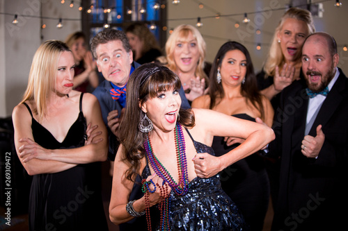 Photography Woman  Threatens to Expose her Breasts at Party Crowd