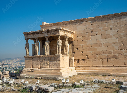 Erechtheion - an ancient Greek temple with a portico and six caryatids, built in honor of Athens and Poseidon, Greece