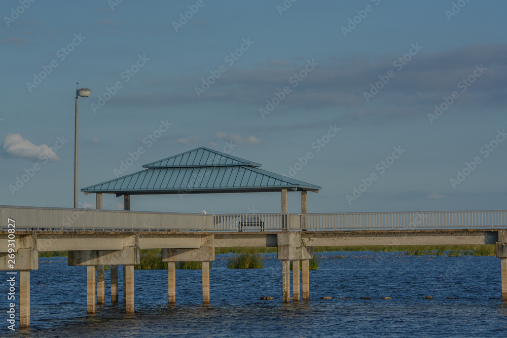 Fishing pier on Lake Okeechobee in Okeechobee County Florida USA Fishing pier on Lake Okeechobee in Okeechobee County Florida USA