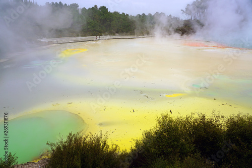 Crater filled with geothermal green waters in the Waiotapu area of the Taupo Volcanic Zone in New Zealand
