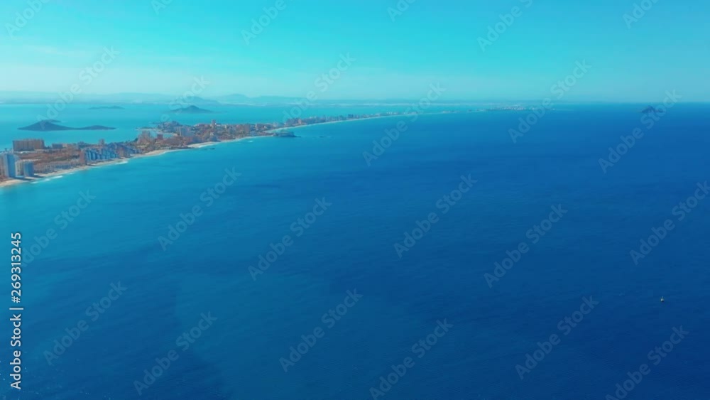 Aerial view. Flight over gorgeous islands, long spit La-Manga,Spain, beautiful azure sea and hills. Aerial view. Flight over gorgeous islands, long spit La-Manga,Spain, beautiful azure sea and hills.