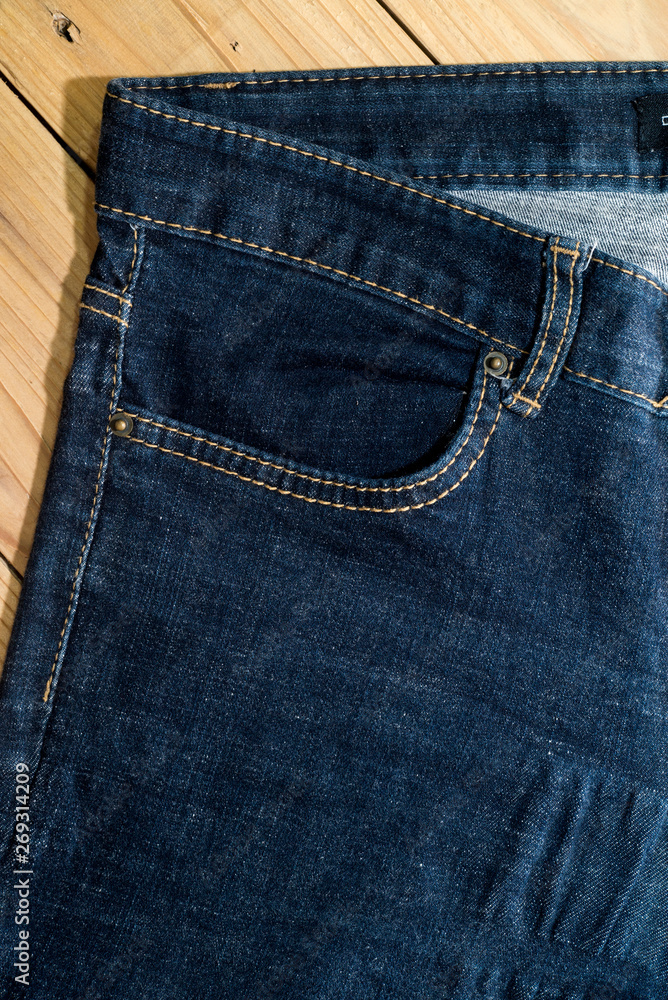 Close up of blue denim jeans fabric texture background. Close up of blue denim jeans fabric texture background.
