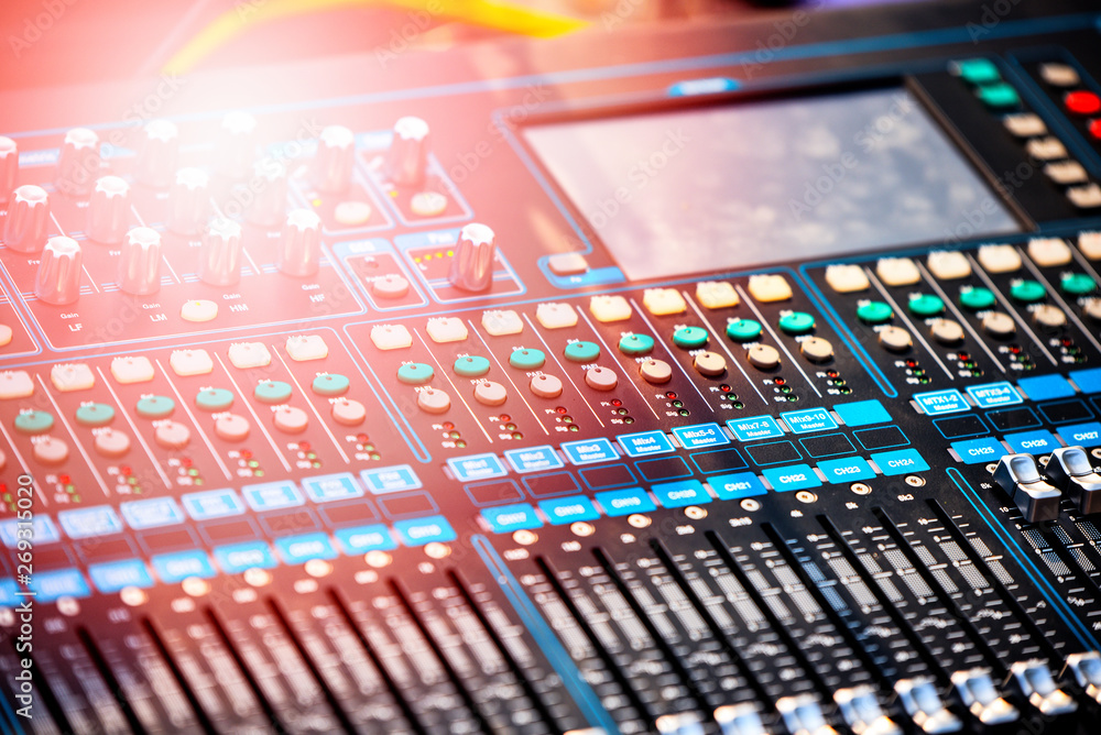 Professional audio mix sound control panel console / Sound technician and lights equipment