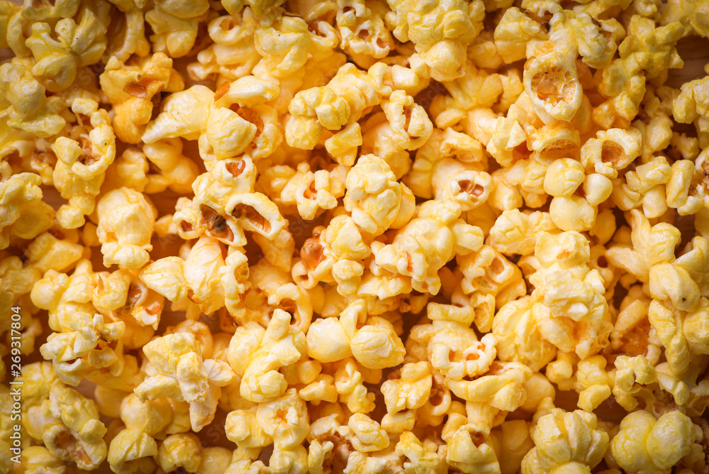 Close up popcorn - Sweet butter popcorn texture background top view Close up popcorn - Sweet butter popcorn texture background top view