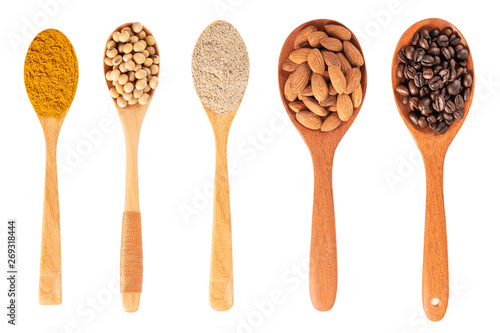 Five kinds of natural grain food  on spoon isolated on white background. photo