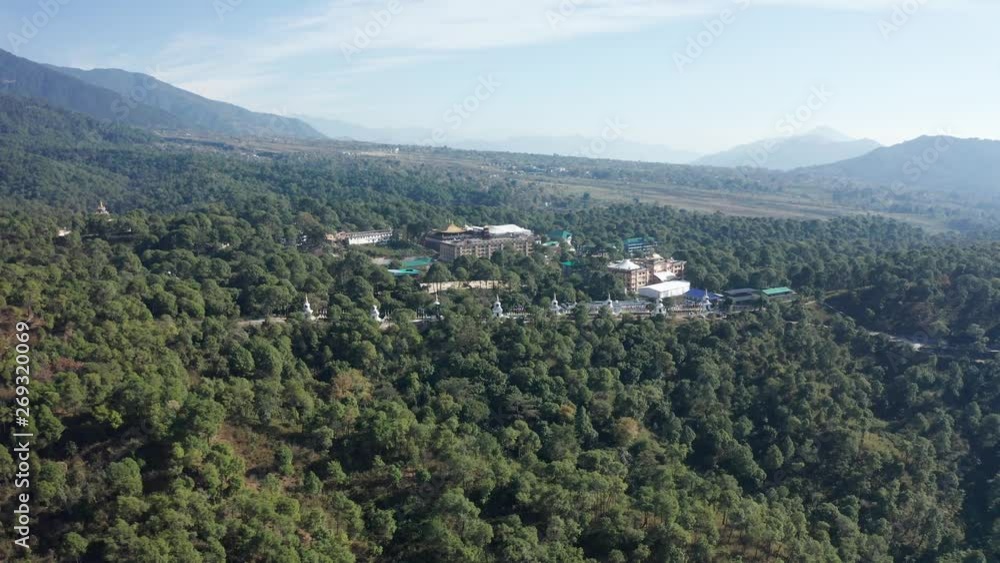 Drone Aerial View of Monastery Buddhist peaceful flags flying Drone Aerial View of Monastery Buddhist peaceful flags flying
