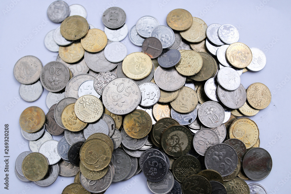 Malaysian coins over white background Malaysian coins over white background