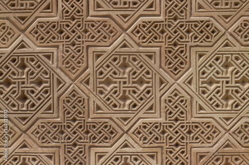 mosaic of clay tiles on a medieval mausoleum in the city of Taraz. Geometric pattern. Eight-pointed star, Muslim symbols in architecture.