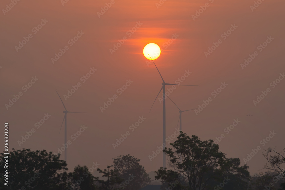 Fototapeta premium Wind turbines with sunset, Renewable Energy and Energy Production with clean