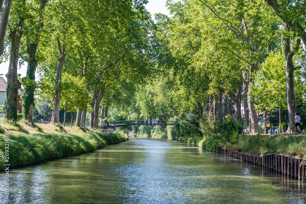 Summer look on Canal du Midi canal in Toulouse, southern Franc Summer look on Canal du Midi canal in Toulouse, southern Franc