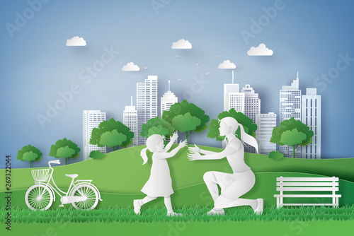 Happy Family Playing in Eco Friendly City Park