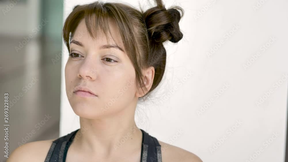Makeup artist makes makeup of a beautiful young caucasian brunette. Medium plan, natural light Makeup artist makes makeup of a beautiful young caucasian brunette. Medium plan, natural light