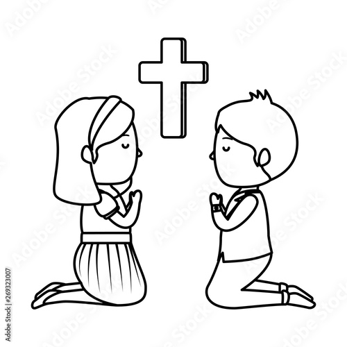 little kids kneeling with cross first communion