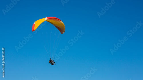 Para Gliding adventure sport against blue sky  india