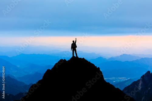Happy man gesture of triumph with hands in the air,conceptual scene