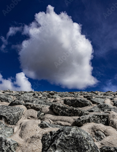 Stoneland with cloudy sky photo